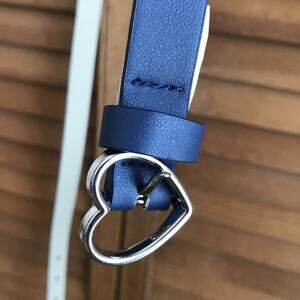 The Children's Place size 8-16 faux leather blue belt with heart shaped buckle.